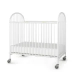 Foundations® Pinnacle™ Compact Folding Steel Crib with Oversized Casters and Foam Mattress