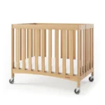 Travel Sleeper® Compact Folding Wood Crib w/ 2" Foam Mattress and Oversized Casters, Natural